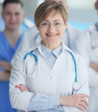 A middle-aged woman is giving a cheerful pose